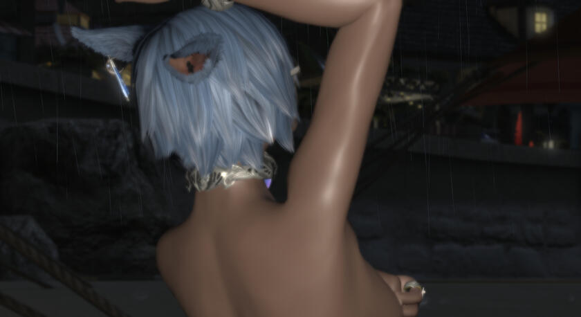 Amani takes a public shower